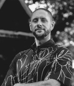 Davis Price, a Hawaiian man, looks at the camera