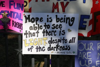 a square sign reads Hope is being able to see that there is light despite all of the darkness.