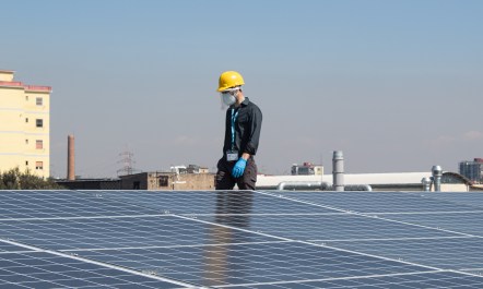 Solar panel technician working