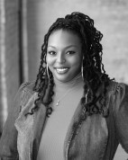 Kaila Adia Story is a Black woman with long locs