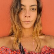 Stephanie Capper is a woman with shoulder-length brown hair